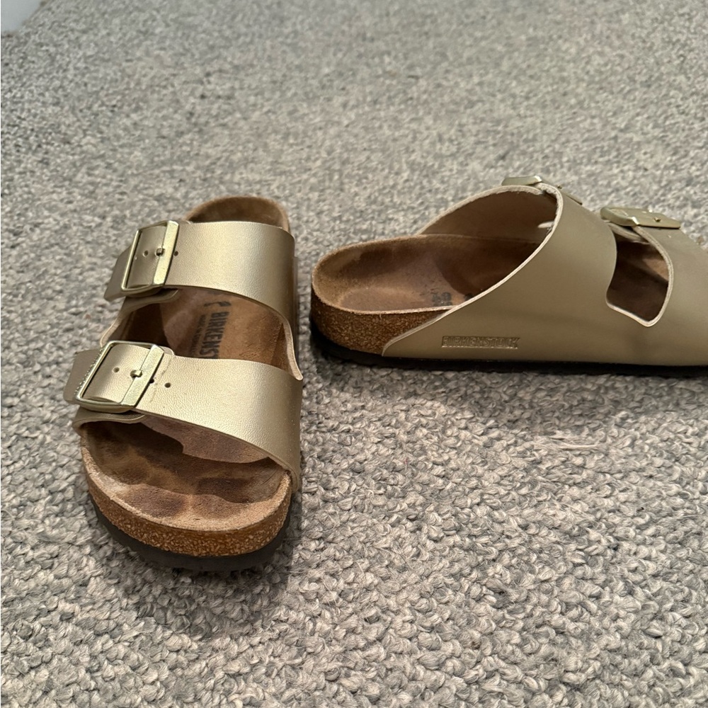Birkenstock Gold Sandals with Adjustable Buckles and Contoured Footbed